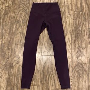 Lululemon Size 4 leggings . Plum color
